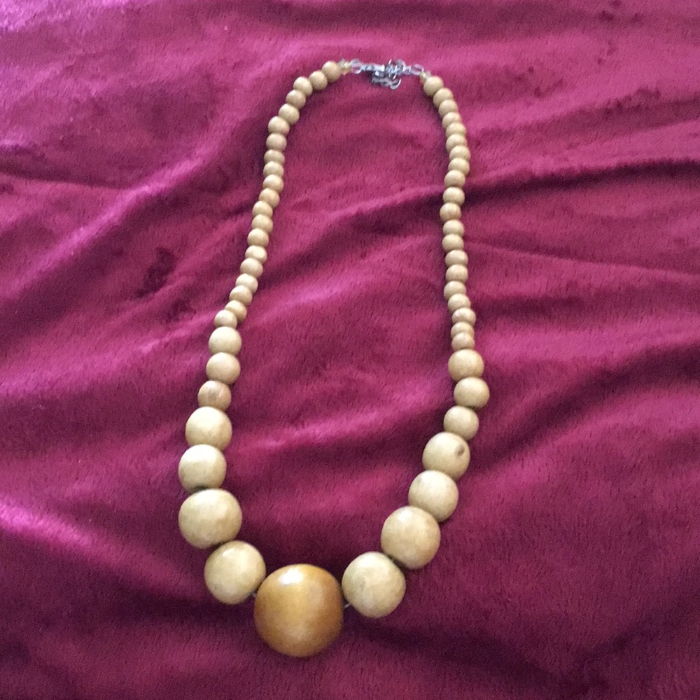 A brown 6’ inch and made with wood it’s been warn